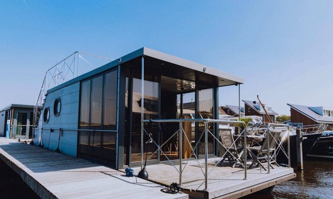 Municipality of Uitgeest Boat Rental | Houseboat at Marina with Lake Views