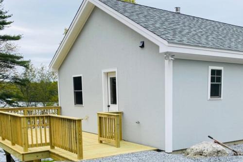 Newcastle House | Hunt Acres Grey Cottage