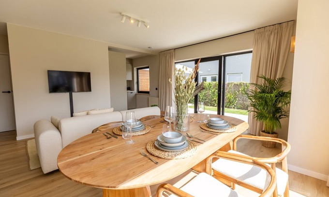 Cadzand-Bad Apartment | Huswell - Charming Apartment with Garden & Parking