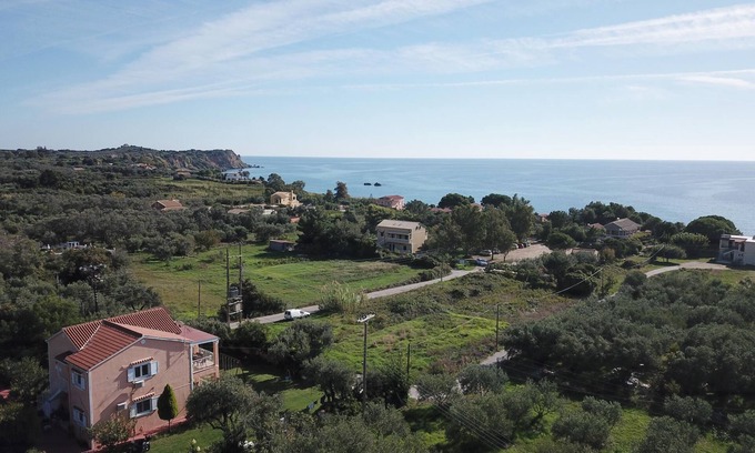 Agios Matthaios Apartment | Ideal for families! Apartment with garden at the beach, wifi | Prassoudi, Corfu