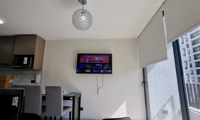 Independencia Apartment | In front of Hospital U. de Chile with parking lot.