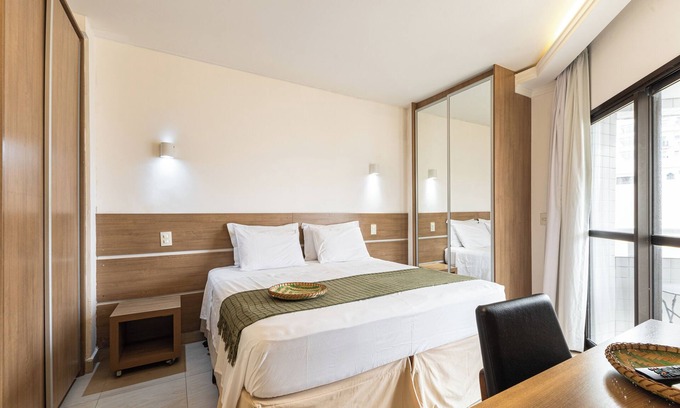 Boqueirao Apartment | In front of the beach! Apartment with rooftop pool and balcony with view - ARK Houses