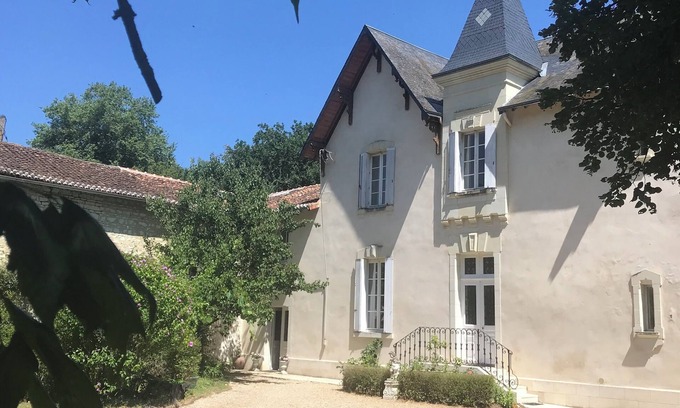 La Roche-Rigault Bed & Breakfast | In the heart of the forest, janitor's cottage Manoir with sauna and Nordic bath access