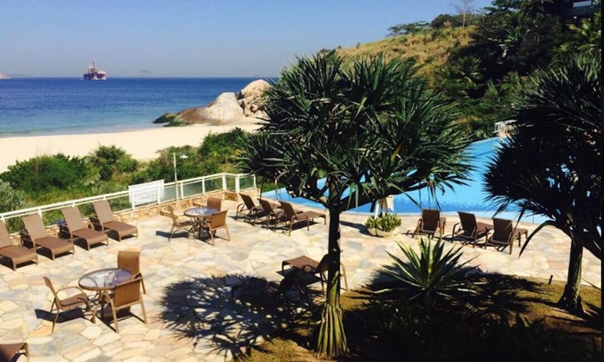 Camboinhas Apartment | INCREDIBLE BEACH FRONT WITH PRIVATE BEACH ACCESS INFINITY POOL BEST AROUND RIO