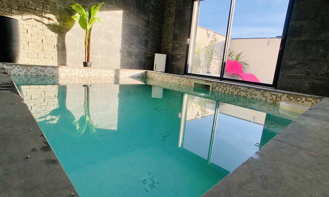 Saint-Nazaire House | Indoor heated whirlpool pool, sleeps 2.