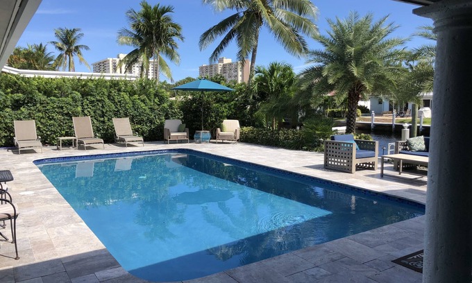 Bel Air House | Intracoastal π΄ Waterfront Pool Home, Walk to Beach, Heated Pool, Sit on Dock