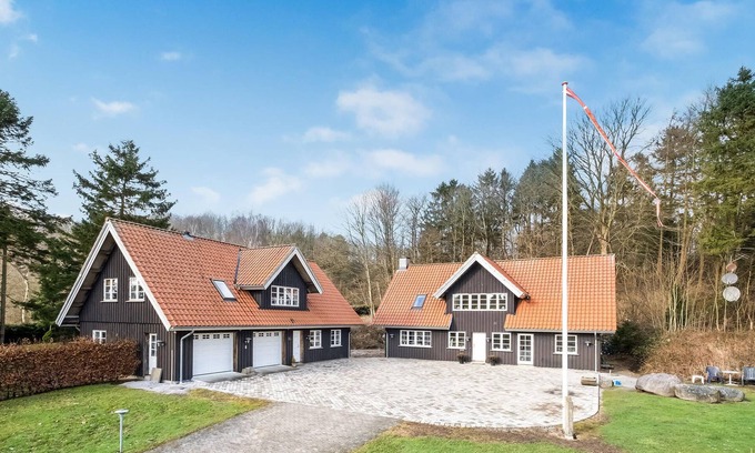 Sabro Apartment | Inviting vacation home with wood stove and grounds, located in a cozy town outside Arhus.