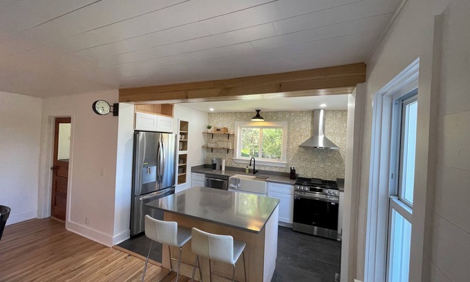 Eveline Township Cottage | Ironton Stone Cottage, walk to Lake Charlevoix beach.