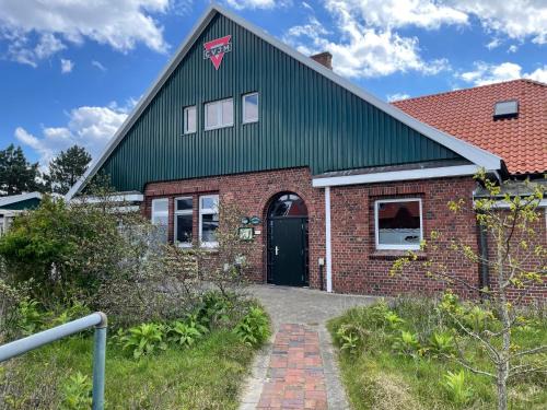 Spiekeroog Cabin | Jugendbildungsstätte Quellerdünen Jugendhaus OG