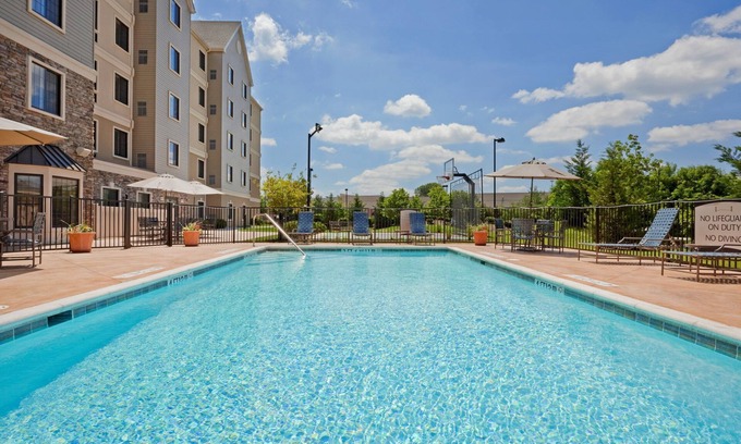 Concordville Condo | King Suite. Free Breakfast. Seasonal Outdoor Pool. Gym. Great for Business Travelers!