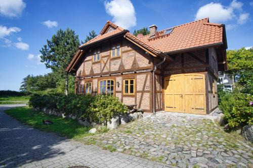 Wiek House | komfortables Haus mit Kamin, Sauna, Garten und Terrasse - Ferienhaus Windhuus