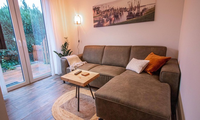 Greetsiel Apartment | Kutsche - Apartments in "Das Posthaus"