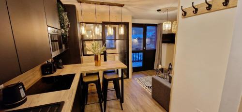 Macot-la-Plagne Apartment | La Cabane - Plagne Village, F2 Ski aux pieds