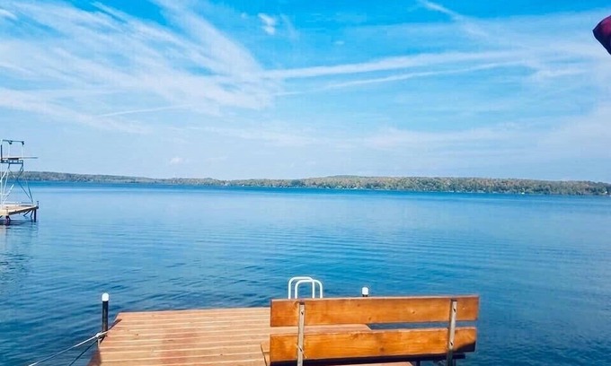 Grand Rapids Cabin | Lake Pokegama recreational cabin with private sandy beach and diving platform.