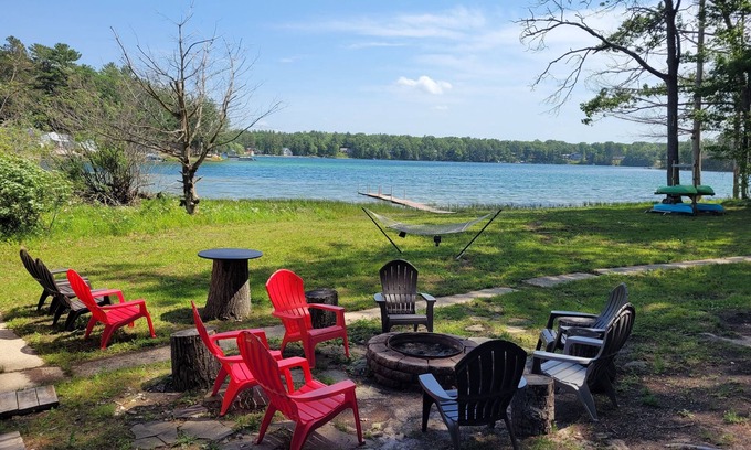 Mancelona Cabin | Lake Therapy - Lakefront, Charming, and Fun with Water Toys!