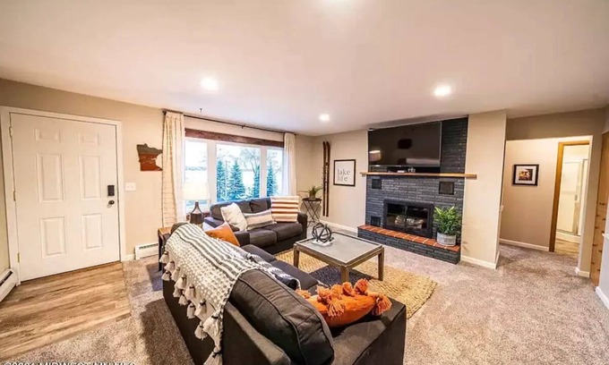 Detroit Lakes Condo | Lakefront Condo, 2 bedroom, with Dock & Private Patio! Walk to Restaurants!