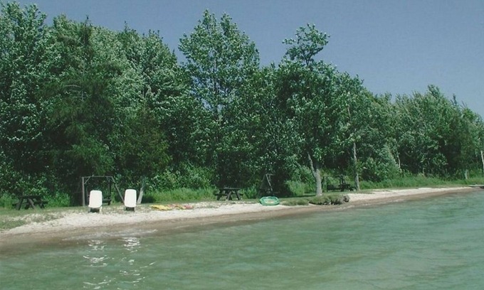 Cheboygan Cabin | Lakefront Cottage - Beautiful Grounds and Large Sandy Beach