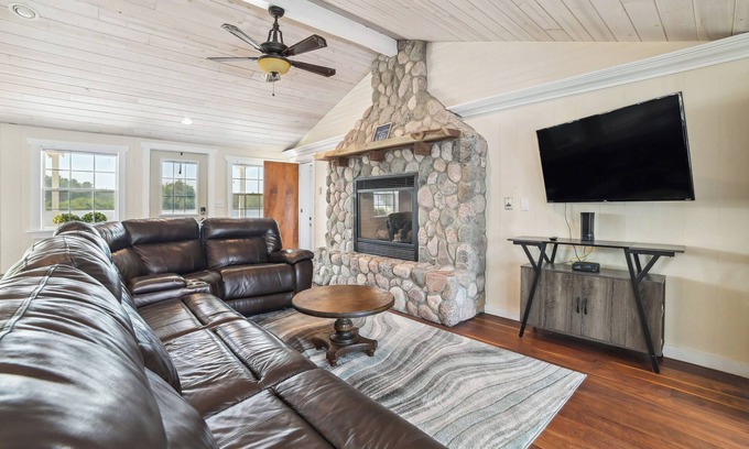 Gladwin Cottage | Lakefront Gladwin Vacation Rental w/Deck & Dock!