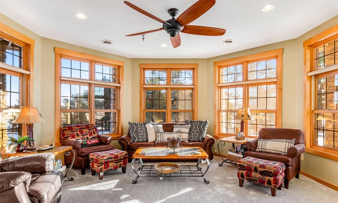 Three Lakes Condo | Lakefront, ground-floor condo with fireplace, patio, private grill & firepit