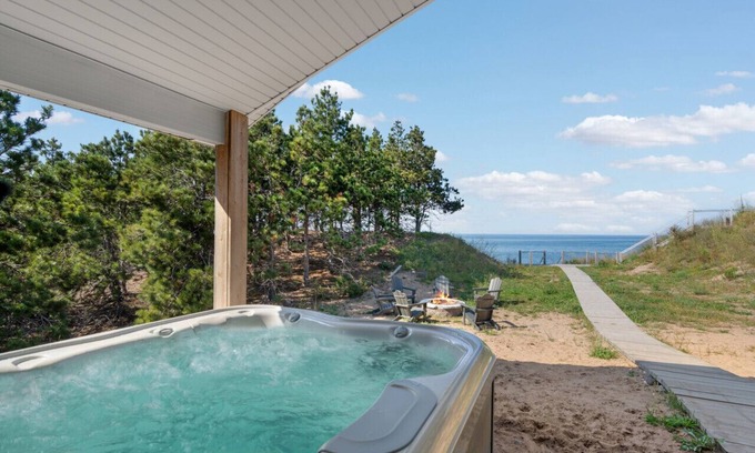 Hancock House | Lakefront home, Beach, Hot tub, Sunsets, Firepit, near McLain State Park