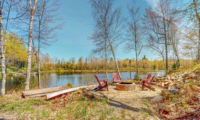 Presque Isle House | Lakefront home with large patio, fire pit, & a provided kayak