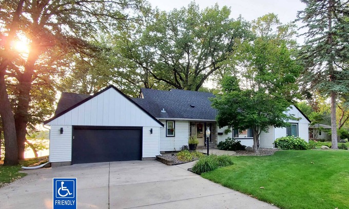 Brooklyn Center Cottage | Lakefront House w/King Bed, Sauna, walk-in shower and lake access