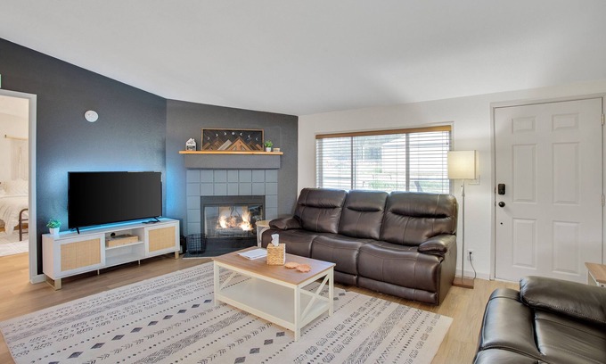 Pine Hollow House | Lakeside King Suite: Luxurious and Cozy with Stunning Golden Hour Views.