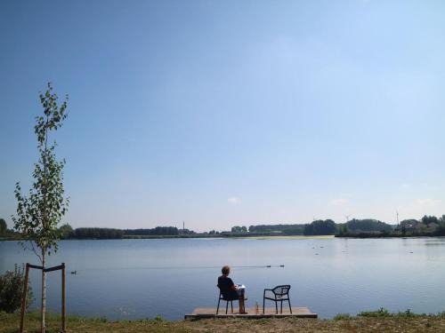 Municipality of Nissewaard House | Lakeview villa with swimming and fishing pier