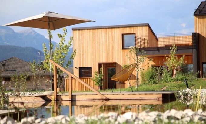 Sarnonico House | Landhaus Silene: new + modern wooden house with large natural garden and swimming pond