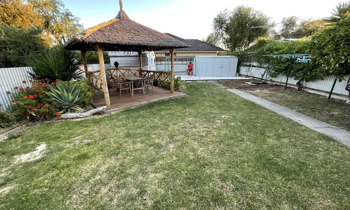 South Plympton House | Large backyard with outdoor seating and BBQ!