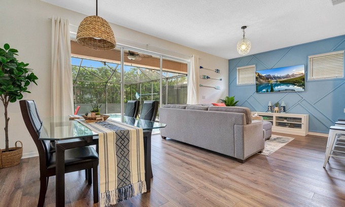 Sunset Lakes House | Large Relaxing Poolside Patio! 4 Miles to Disney.