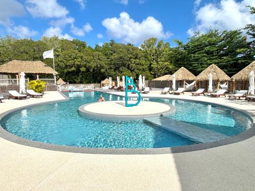 Grand-Bourg Apartment | Le Cocon Miel, Piscine, Plage accessible à pied, Tennis