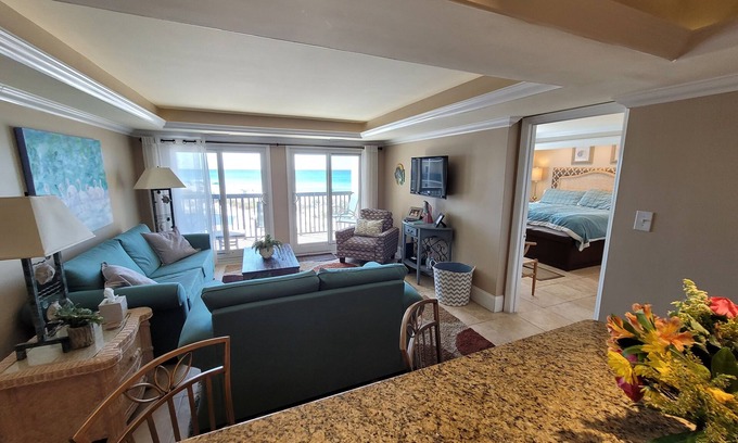 Sunnyside Condo | Let The Sound Of Our Waves Rejuvenate Your Soul!