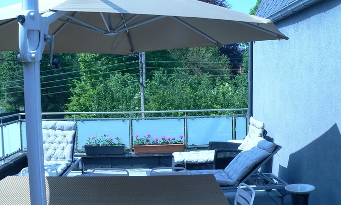 Saint-Nicolas House | Liège cheerful modern house for 8pers with 30m2 terrace and enclosed courtyard.
