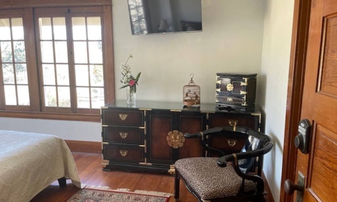 Carnation Bed & Breakfast | Light-filled room with a treetop view in an updated historic Forest Grove home!