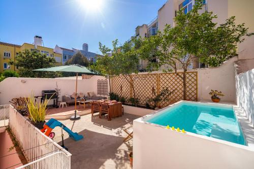 Santo Amaro Apartment | Lisbon Design Flat, Luxury, 7 People, Pool & Garden