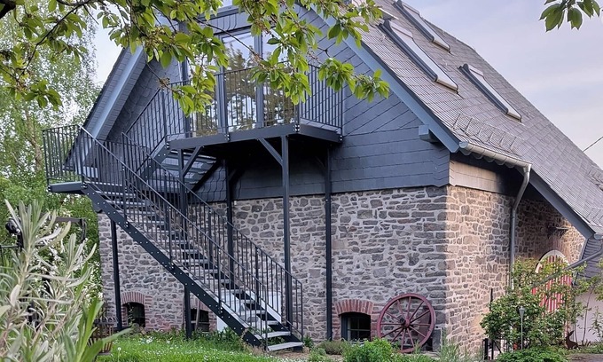 Stahlhofen House | Living in a barn "Basalt barn Westerwald" - close to nature & unique