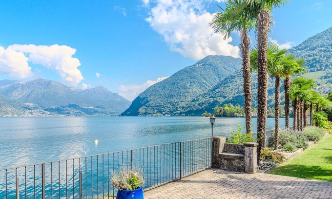 Claino Con Osteno Apartment | Lovely apartment for 4 guests with WIFI, TV, balcony and parking