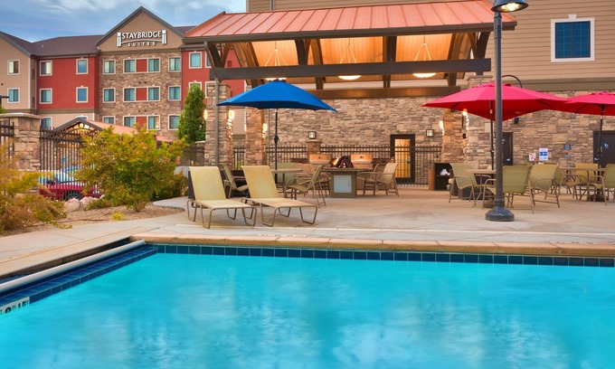 Midvale Condo | Lovely King Suite | Access to a Heated Pool & Hot Tub. Free Breakfast Buffet. Near Jordan Landing!