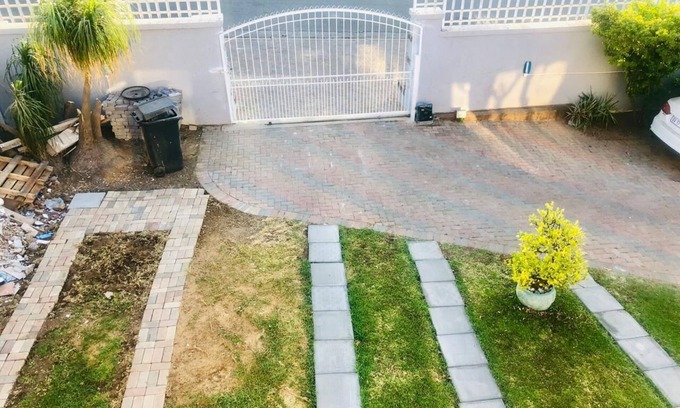 Randpark Ridge House | Lovely Studio Apartment sitting on a lovely acreage with natural man made rocks.