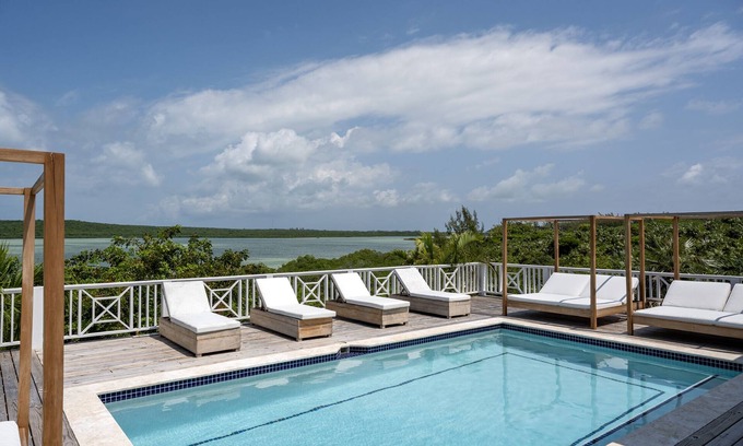 Savannah Sound House | Lux New Windermere Home w/Pool, Boat Dock, Beach Access, Club Membership