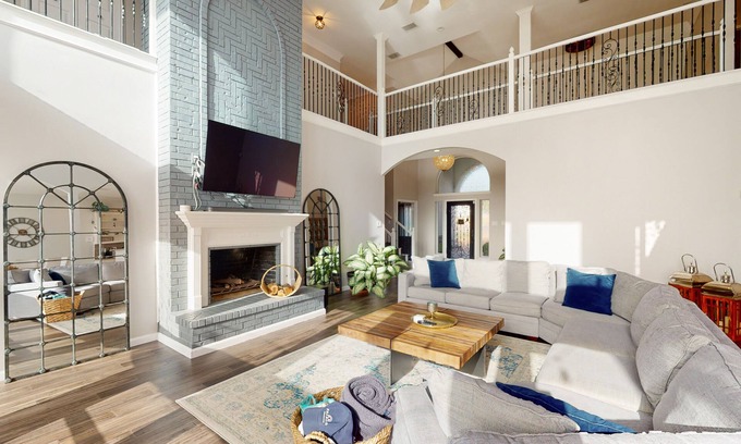 Rowlett House | Luxe, lakefront home with amazing private pool with fountain & home office