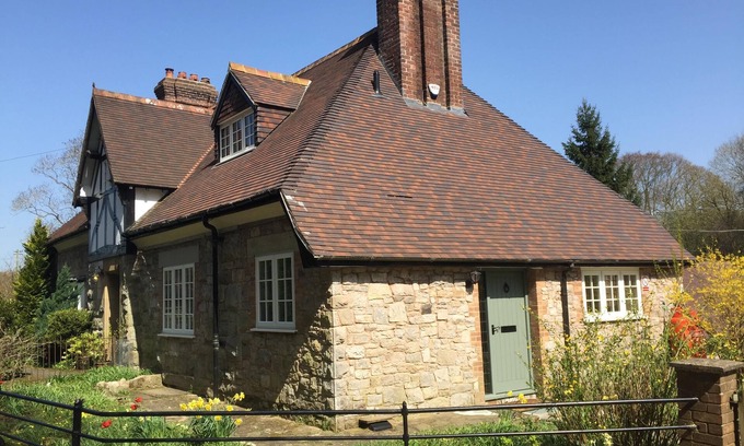 Nannerch House | Luxury 5 bedroom (sleeps 8), 1875 stone cottage, Fully refurbished with Hot Tub
