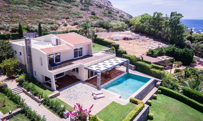 Palaia Fokaia House | Luxury accommodation near Sounio with panoramic sea views and private parking.
