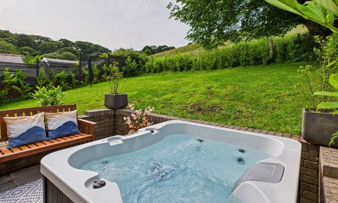 Burry Port Cottage | LUXURY BEACH STAY WITH HOT TUB, pet friendly in Burry Port