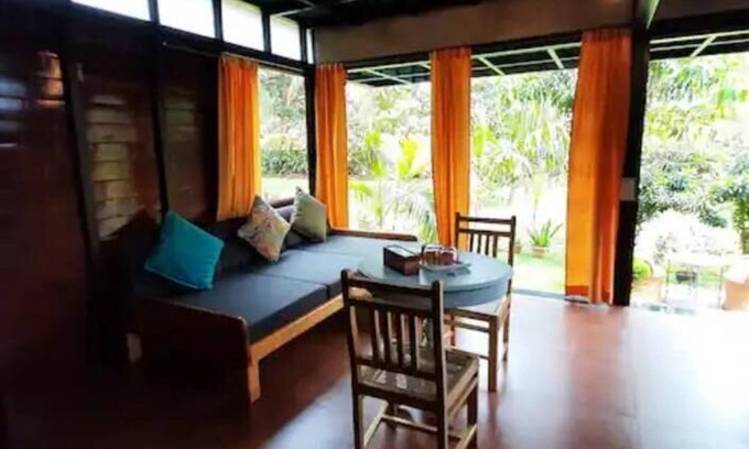 Morjim House | Luxury cottages in lush green panoramic windows