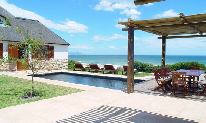 Voelklip Villa | Luxury Historic Villa, Best Position In Hermanus with inverter for blackouts!