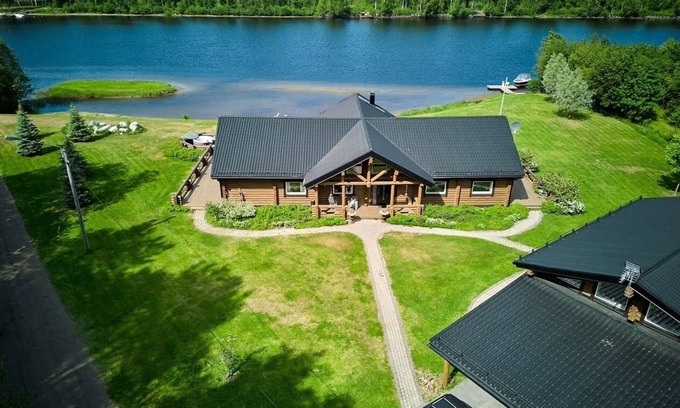 Skelleftea O Villa | Luxury Log Home villa right on the river in Sweden