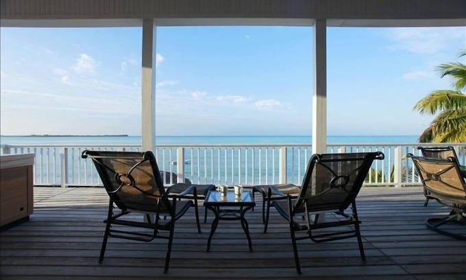 Cherokee House | Luxury Oceanfront with HOT TUB - BOAT, kayaks, paddleboards included -PARADISE!