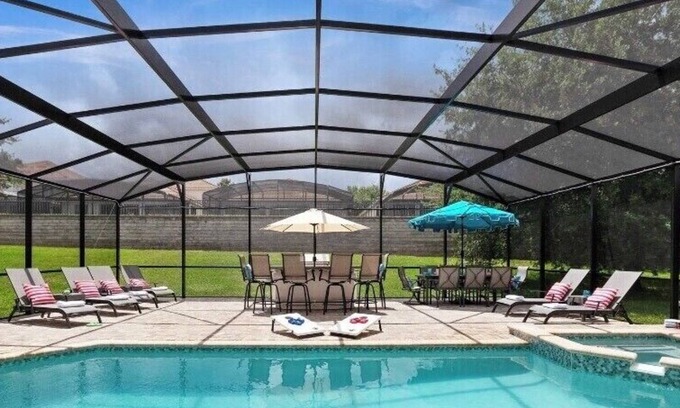 Windsor Hills House | Magical 5 bedroom villa, extended pool deck and movie theatre room near Disney